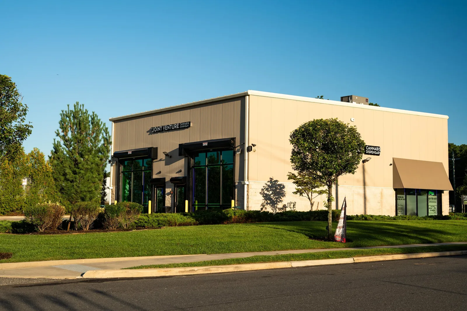 The Joint Venture building on Munsell Road in Medford, New York, with its sign above the entrance.
